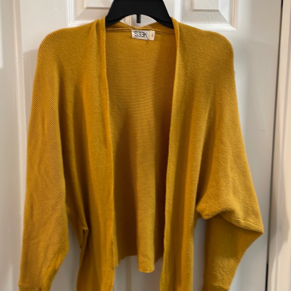 Seek tie bottom yellow shrug sweater